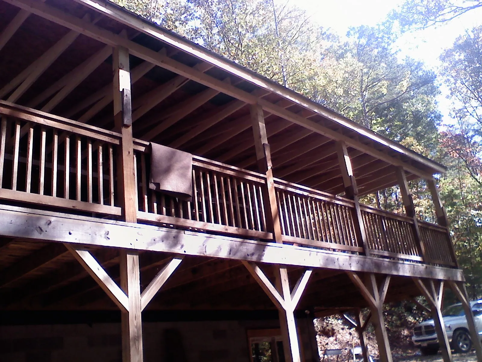 Timber framing under a new elevated porch and deck — Roof Leak Repair in Sylvia by Roofing Brothers